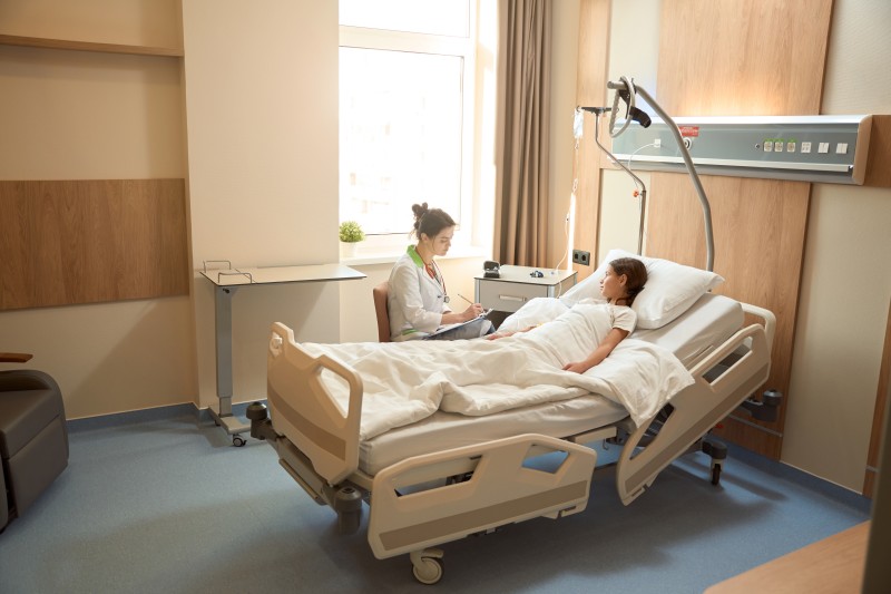 Hospital bed for elderly at home